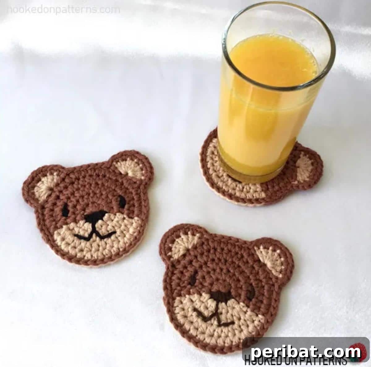 34 Inspiring Crochet Coaster Patterns 12 Cute teddy bear face crochet coasters, bringing a cozy and playful touch to table settings.