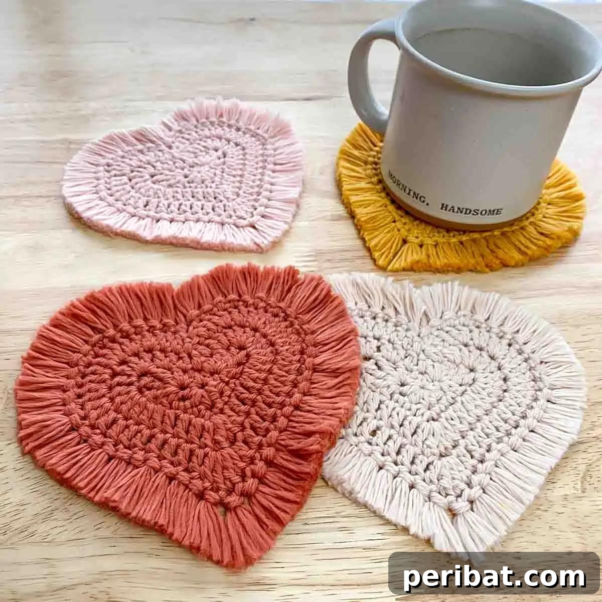 34 Inspiring Crochet Coaster Patterns 17 A textured boho crochet heart coaster in a natural, earthy tone, featuring fringe details for a rustic, romantic look.
