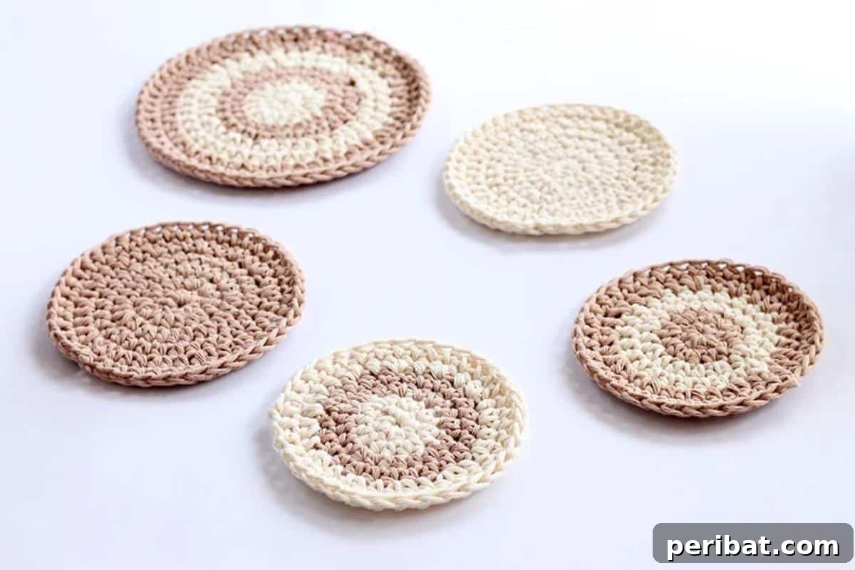 34 Inspiring Crochet Coaster Patterns 21 A stack of simple, round crochet coasters in natural, earthy tones, perfect for a farmhouse aesthetic.