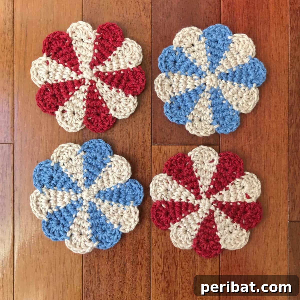 34 Inspiring Crochet Coaster Patterns 22 Patriotic flag-inspired crochet coasters in red, white, and blue, celebrating the 'Home of the Brave' theme.