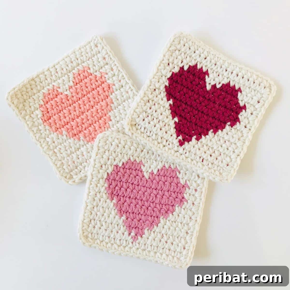 34 Inspiring Crochet Coaster Patterns 30 A set of flat tapestry crochet coasters featuring geometric patterns and colorwork, adding an artistic touch.