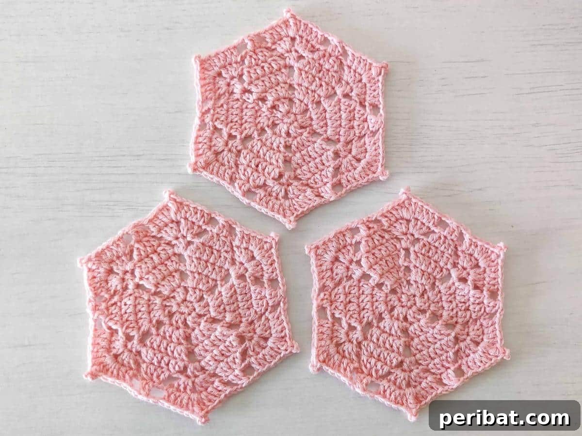 34 Inspiring Crochet Coaster Patterns 8 Modern diamond-patterned crochet coasters in hexagonal shapes, crafted with intricate filet crochet technique.