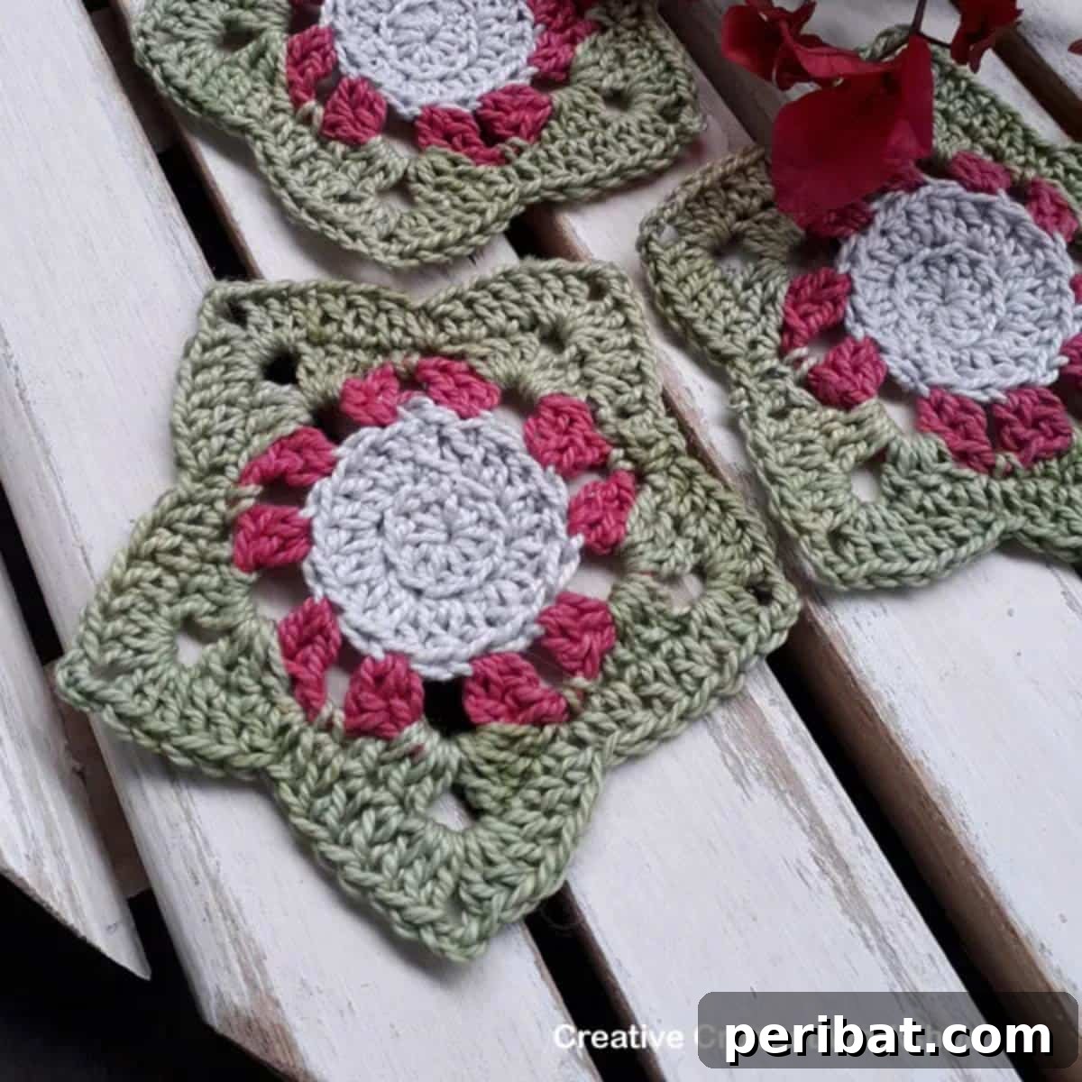 34 Inspiring Crochet Coaster Patterns 9 Festive Christmas wish star-shaped crochet coasters in various holiday colors, adorned with a simple pattern.