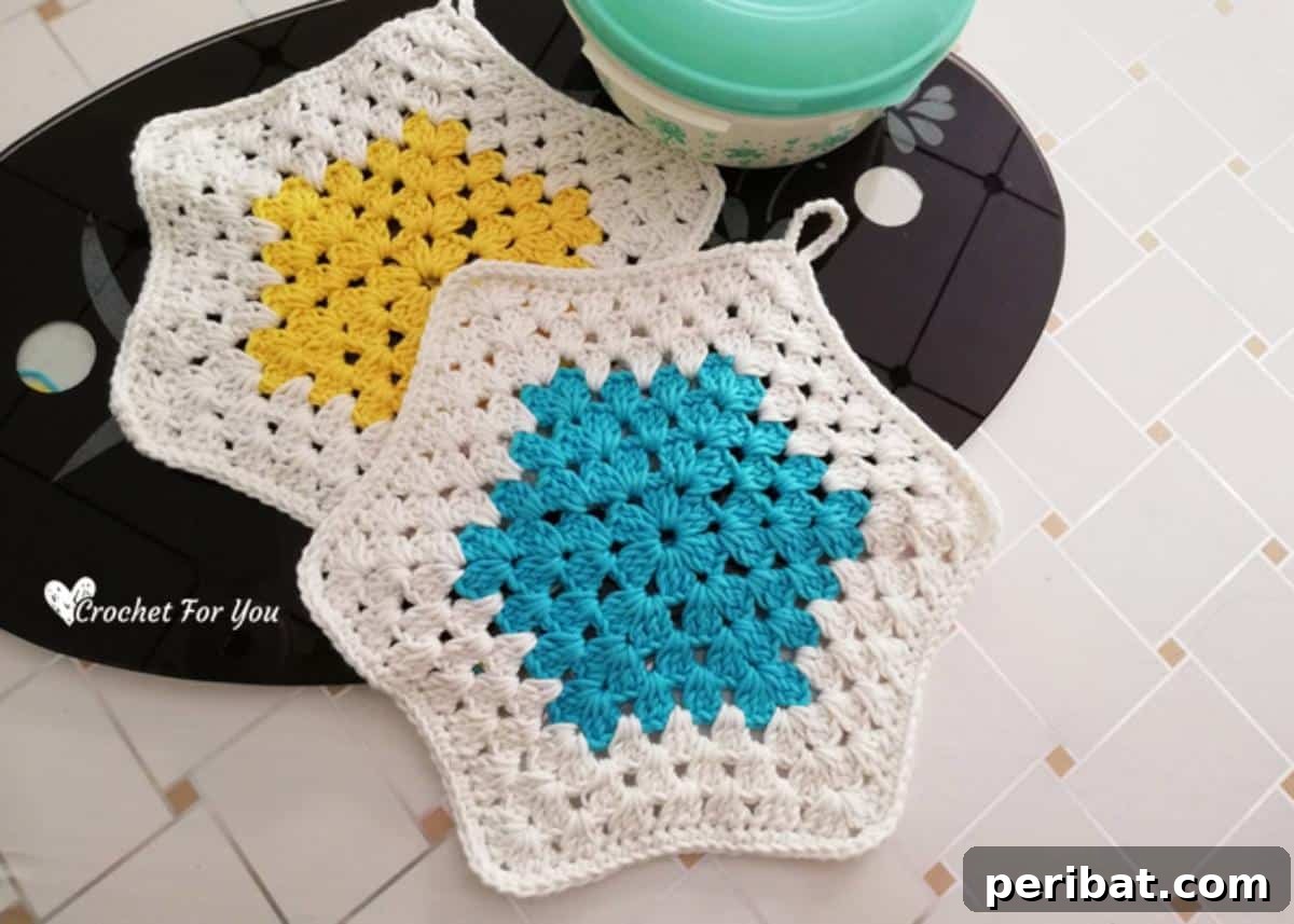 A vibrant crochet granny hexagon potholder, showcasing multiple colors and a classic granny stitch design in a unique geometric shape.