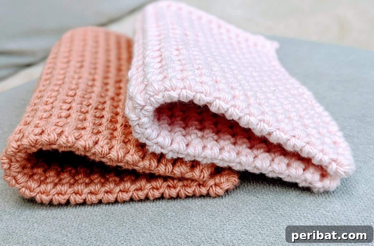 An extra thick crochet potholder, highlighting its dense construction and superior thermal stitch for maximum heat insulation.