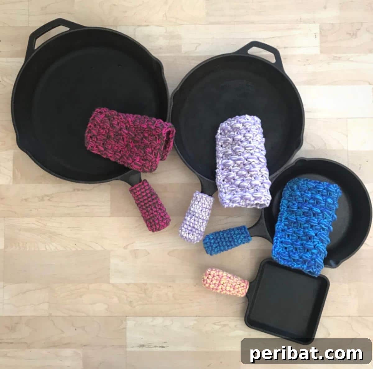 A set of cast iron pot holders, including a handle cover, robustly designed for the demands of heavy-duty cast iron cookware.