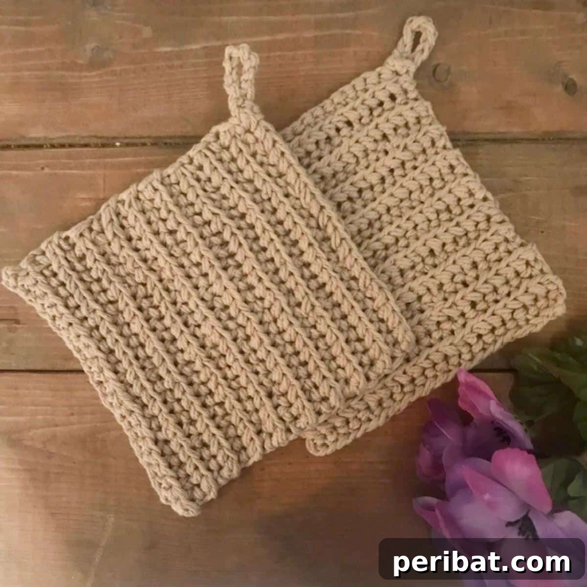A simple, sturdy, and practically perfect crochet potholder in a neutral color, emphasizing its robust reliability for kitchen use.