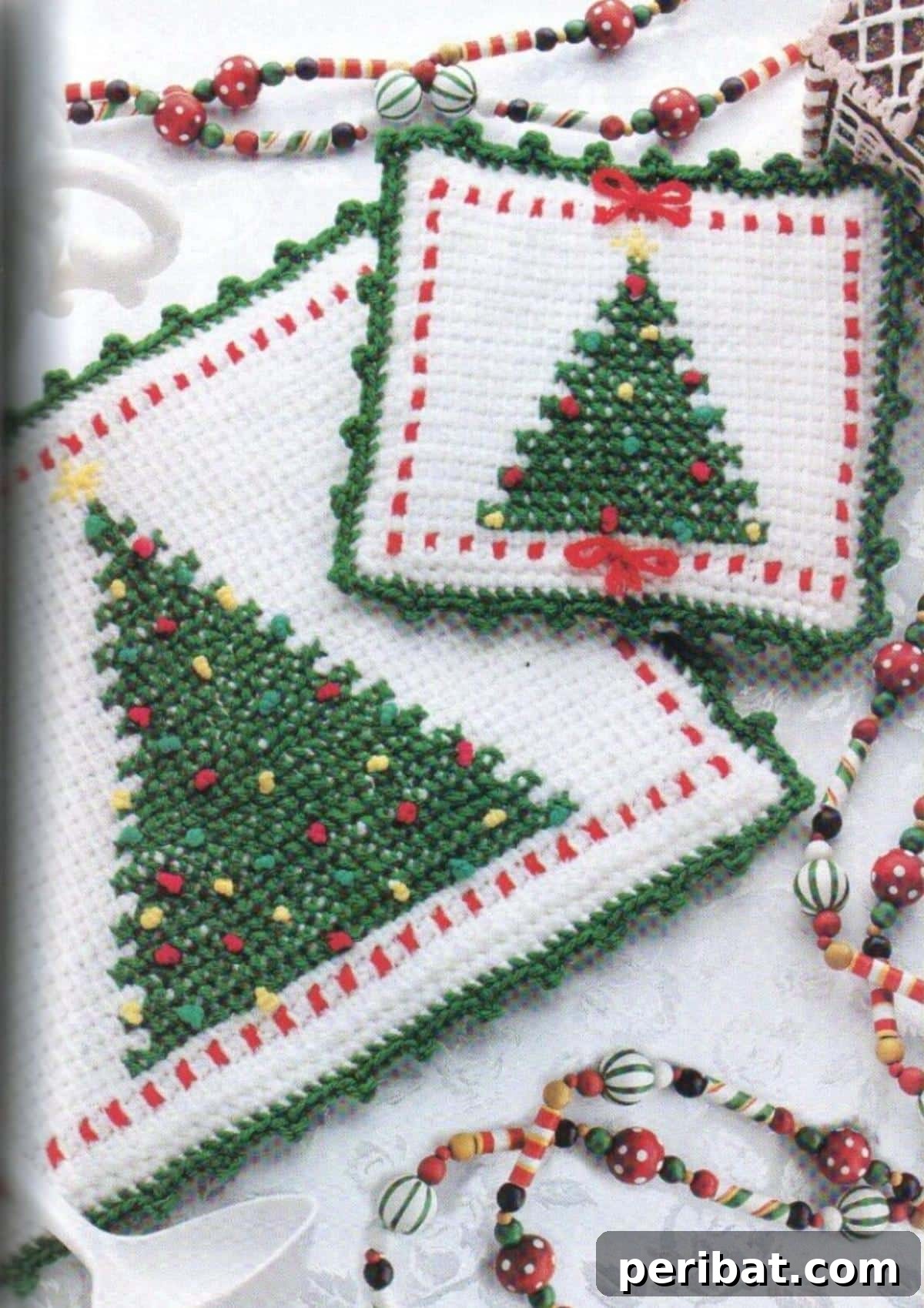 A festive collection of vintage Christmas kitchen pot holders and hot pads, featuring classic holiday motifs and bold, retro colors.
