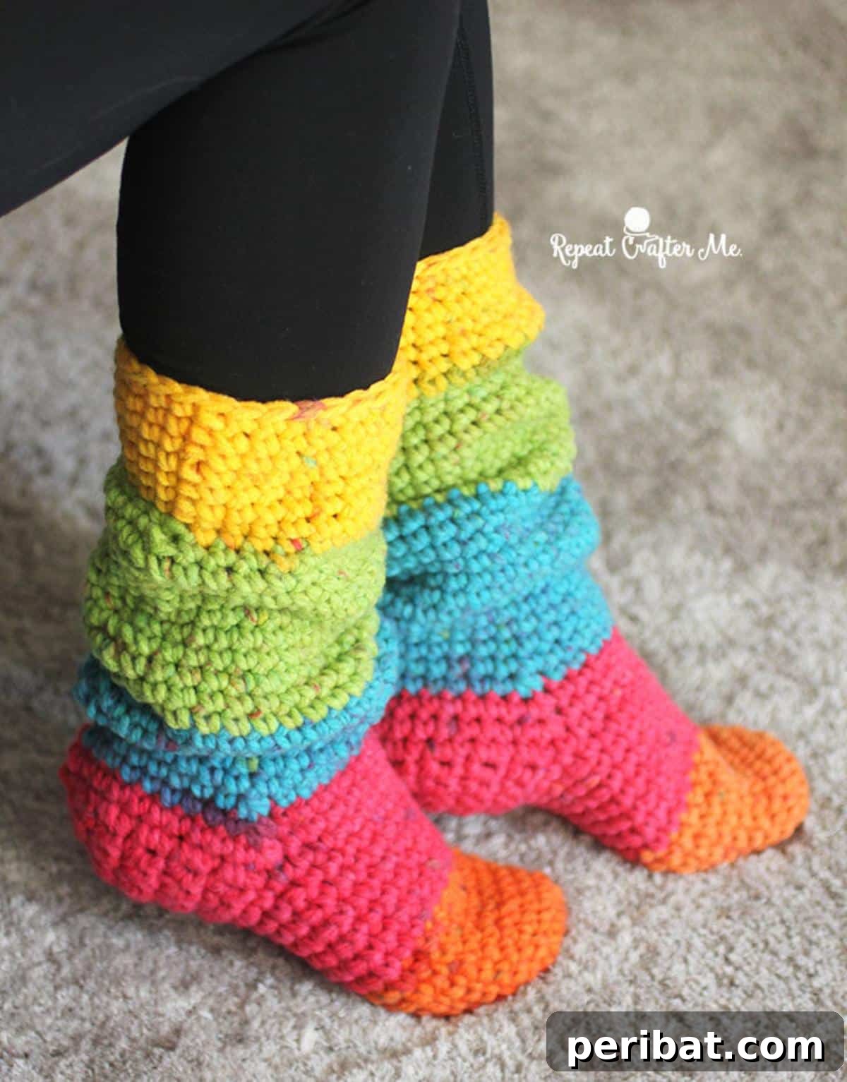 26 Quick & Cozy Chunky Crochet Projects 11 A pair of vibrant Caron Chunky Cakes Slouchy Slipper Socks, featuring a self-striping design for unique color combinations.