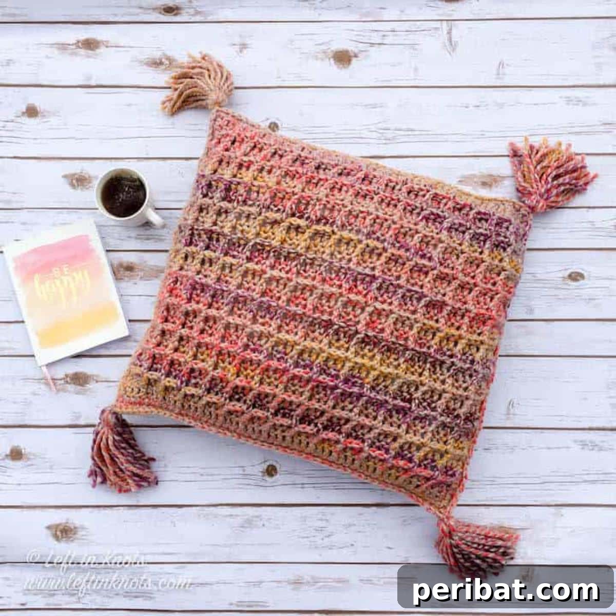 26 Quick & Cozy Chunky Crochet Projects 15 A cozy Waffle Stitch Throw Pillow, highlighting its deep texture and inviting feel, perfect for home decor.