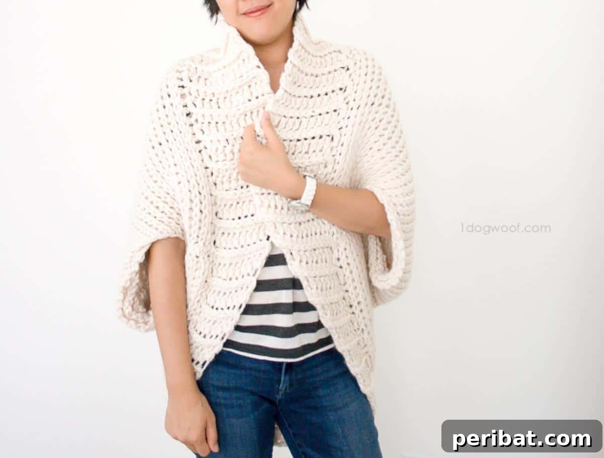 26 Quick & Cozy Chunky Crochet Projects 16 A model wearing a Simple Starlight Crochet Shrug, demonstrating its elegant drape and knit-like texture achieved with Tunisian crochet.