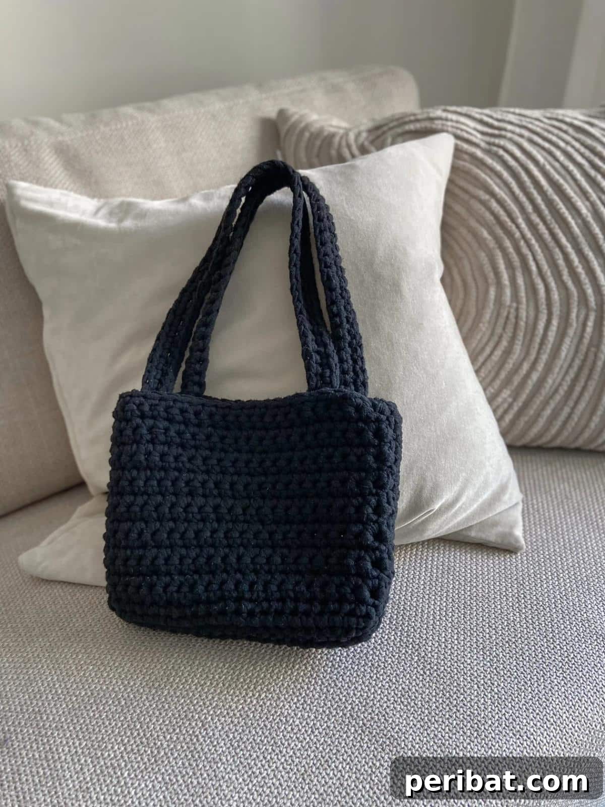 26 Quick & Cozy Chunky Crochet Projects 26 A stylish Crochet Chunky Bag, showcasing its sturdy construction and fashionable design, perfect for carrying essentials.