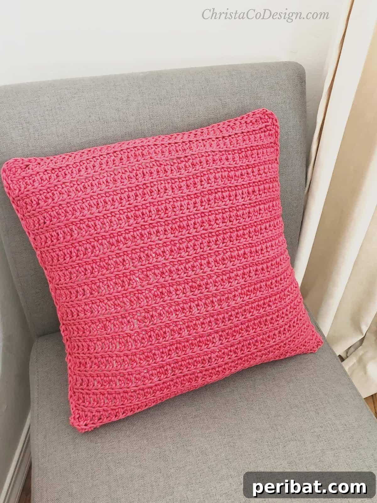 40 Creative Crochet Pillow Projects 21 A practical envelope crochet pillow, featuring a removable cover design for easy washing and a neat, finished look.
