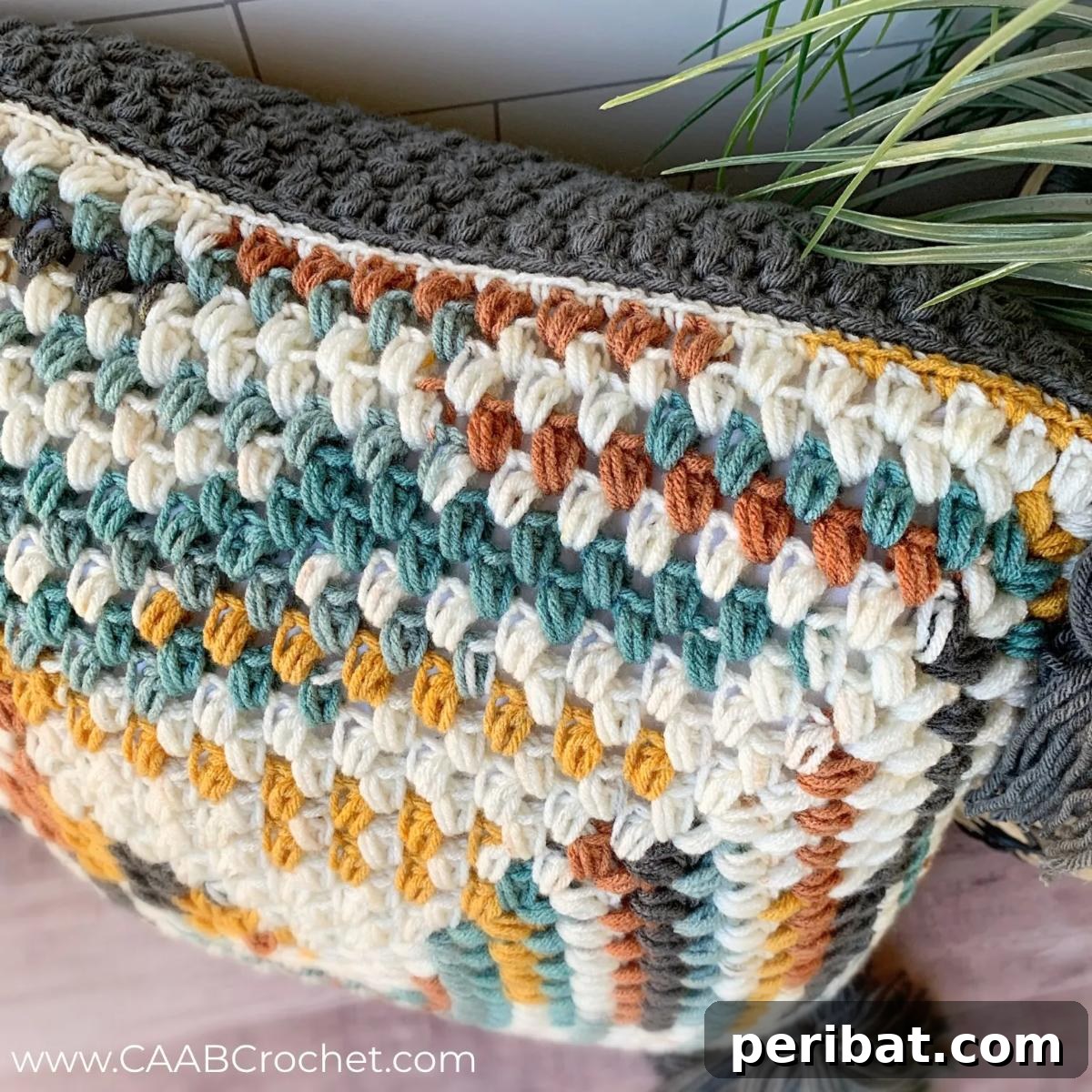 40 Creative Crochet Pillow Projects 30 A uniquely textured 'Spill the Beans' crochet pillow, made entirely with the distinctive bean stitch to create a rich, tactile surface.