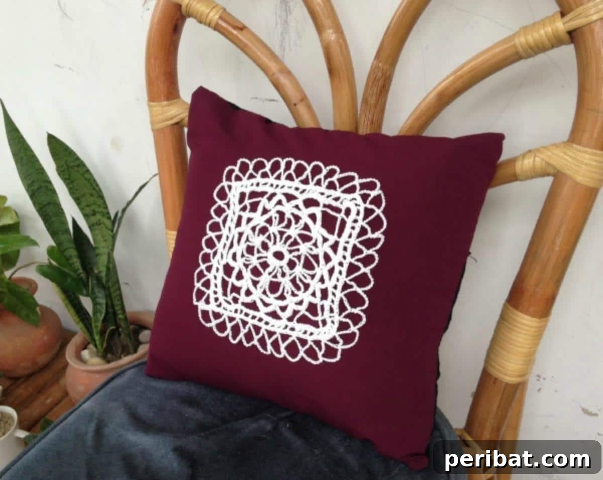 40 Creative Crochet Pillow Projects 36 An elegant Irish Lace crochet pillow, featuring delicate and intricate lace patterns that add a classic, refined touch to decor.