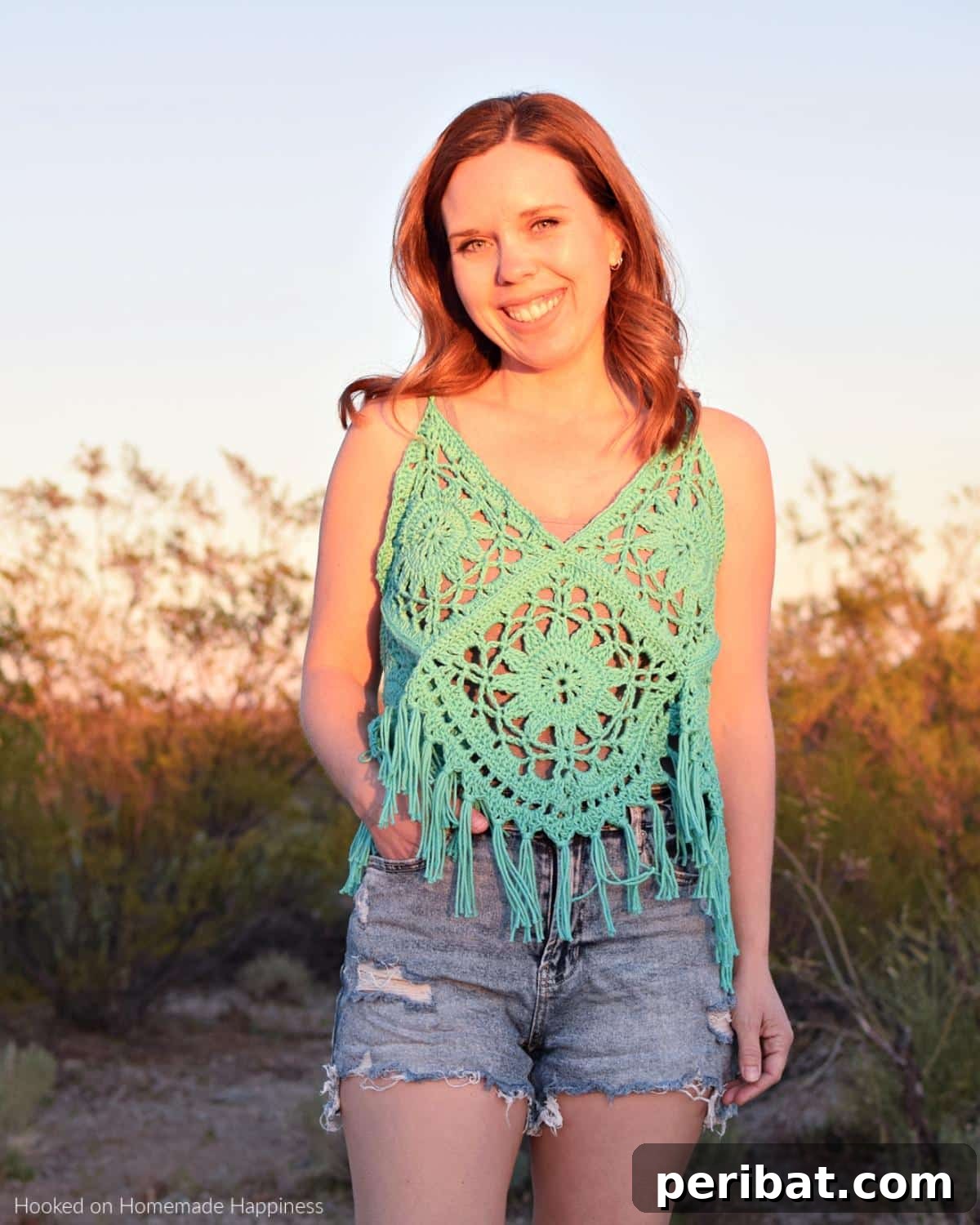 Chic Crochet Boho Tank Top with intricate details and flowing silhouette.