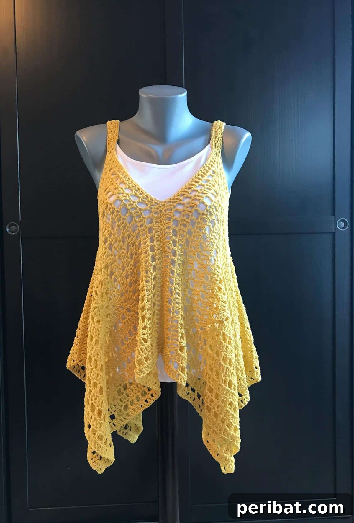 Flowy Kanata Kerchief Tank, crafted with basic stitches and DK yarn.