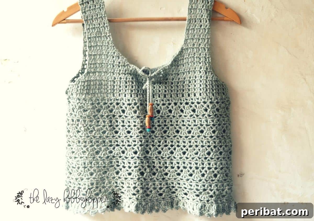 Chic Lace Summer Top with intricate lace patterns, perfect for elegant summer style.