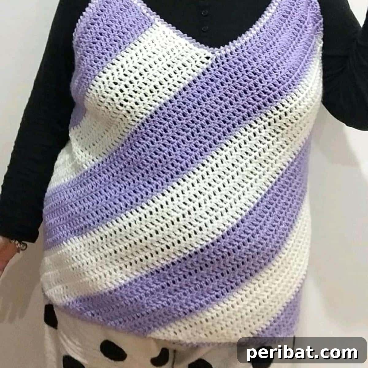 Flattering Diagonal Crochet Tank Top with unique construction and silhouette.