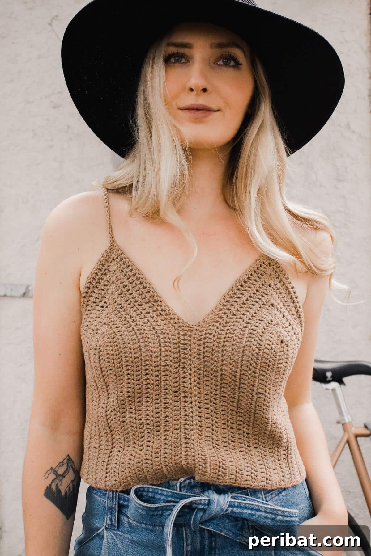 Beginner-friendly Chasing Summer Tank Top using double crochet stitches for a breezy feel.