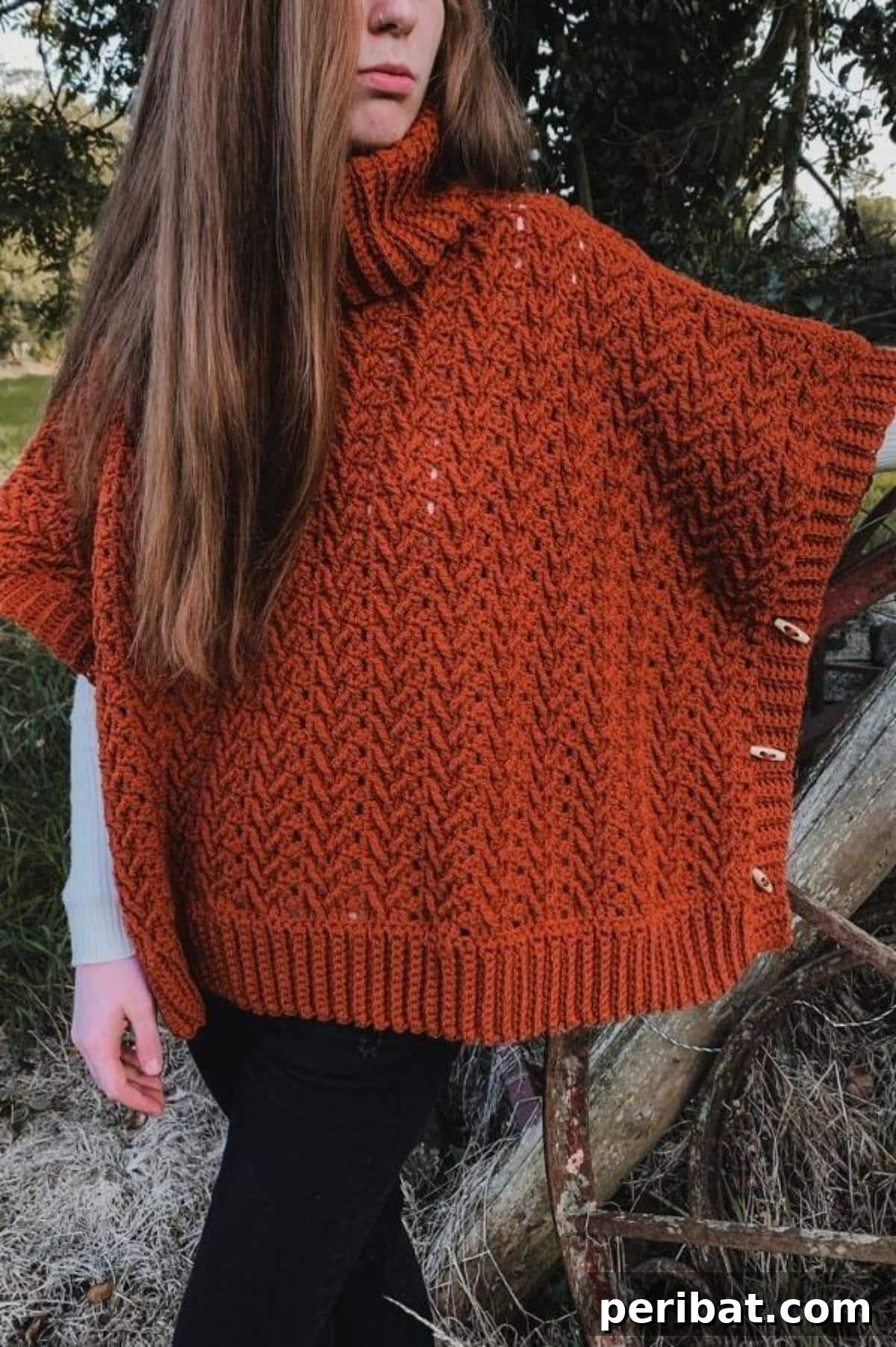 Harvest Turtleneck Poncho, a warm and stylish crochet design featuring a prominent turtleneck and rich harvest colors.
