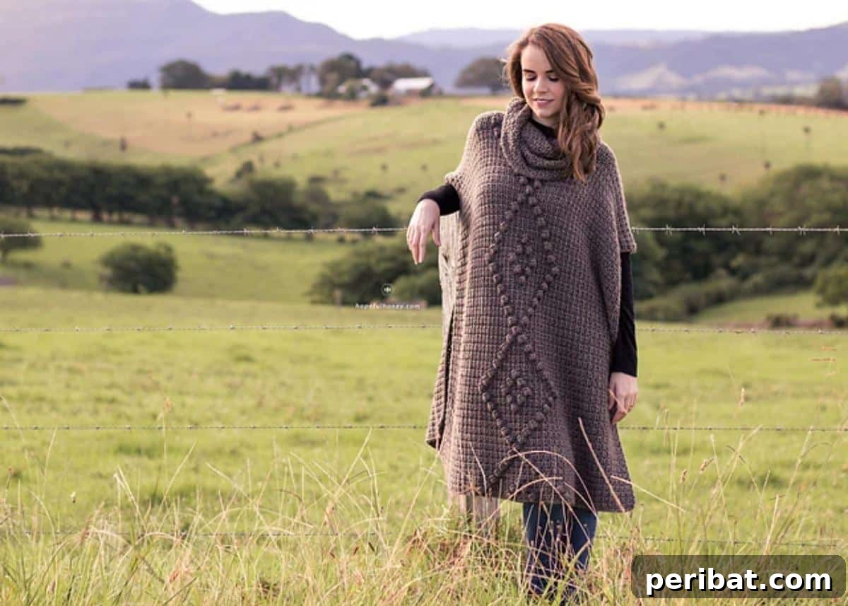 Alsace Crochet Poncho, an elegant and sophisticated pattern for crocheters looking for a chic and fashionable project.