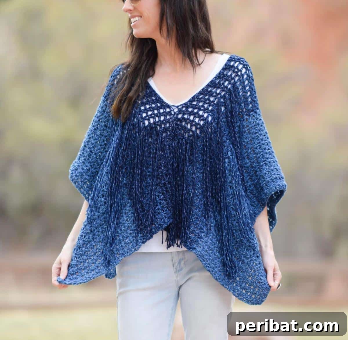 Boho Poncho, a free-spirited crochet pattern featuring a loose fit and fringe details for a relaxed bohemian vibe.