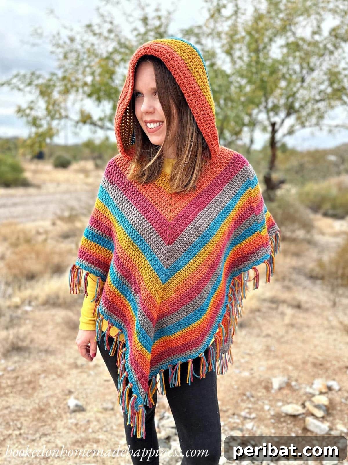 Easy All DC Hooded Poncho, a straightforward crochet pattern made with double crochet stitches, providing a practical hood for extra warmth.