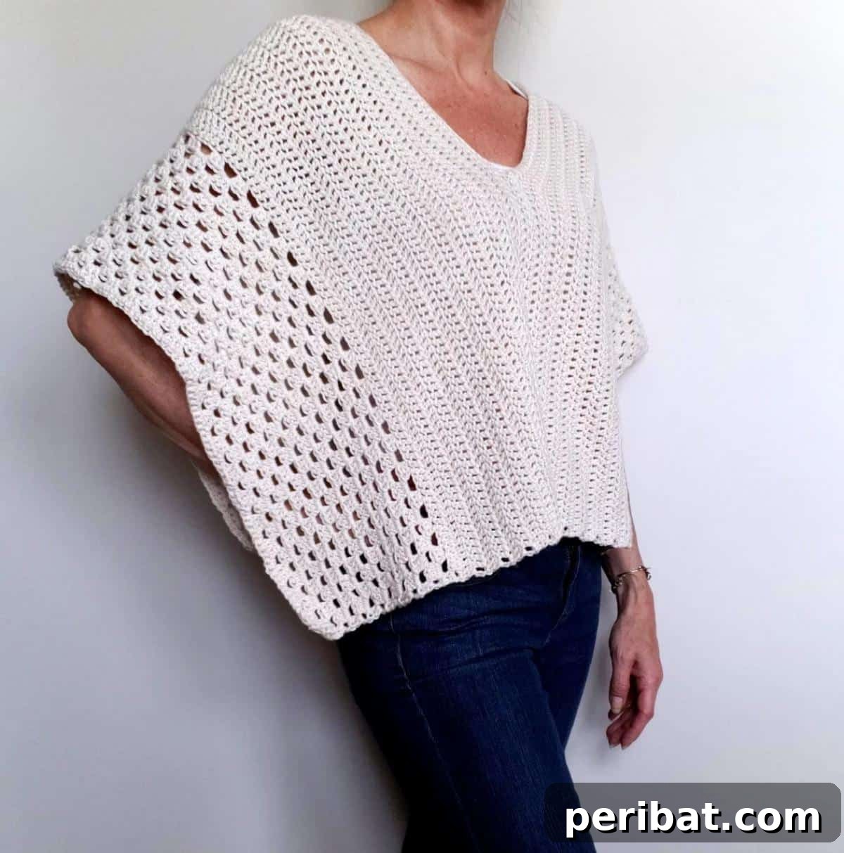 Cotton Spring Poncho, a light and airy crochet pattern ideal for welcoming warmer weather with a breathable design.