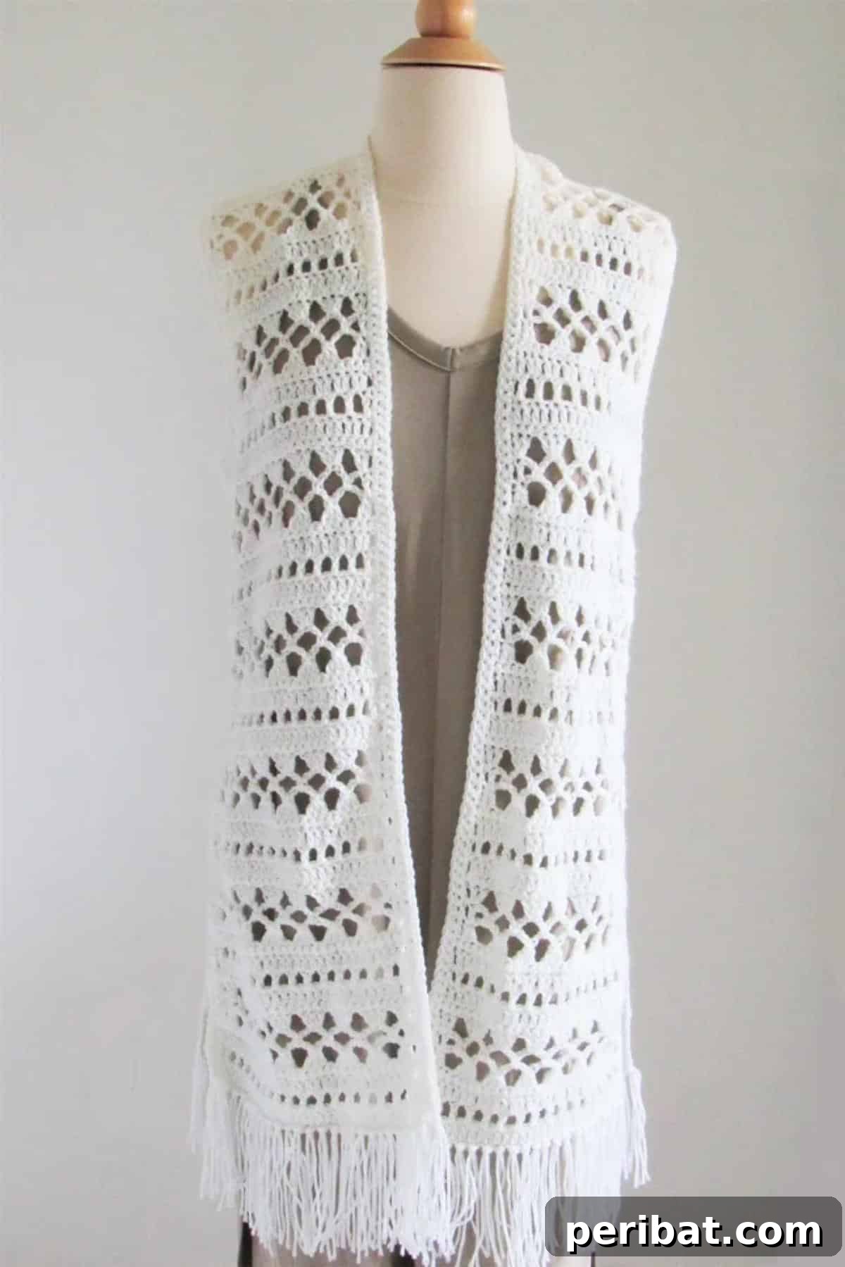 40 Chic Crochet Vest Designs 17 Easy Valerie Vest - A chic and straightforward crochet vest pattern, perfect for beginners looking for an elegant, versatile garment.