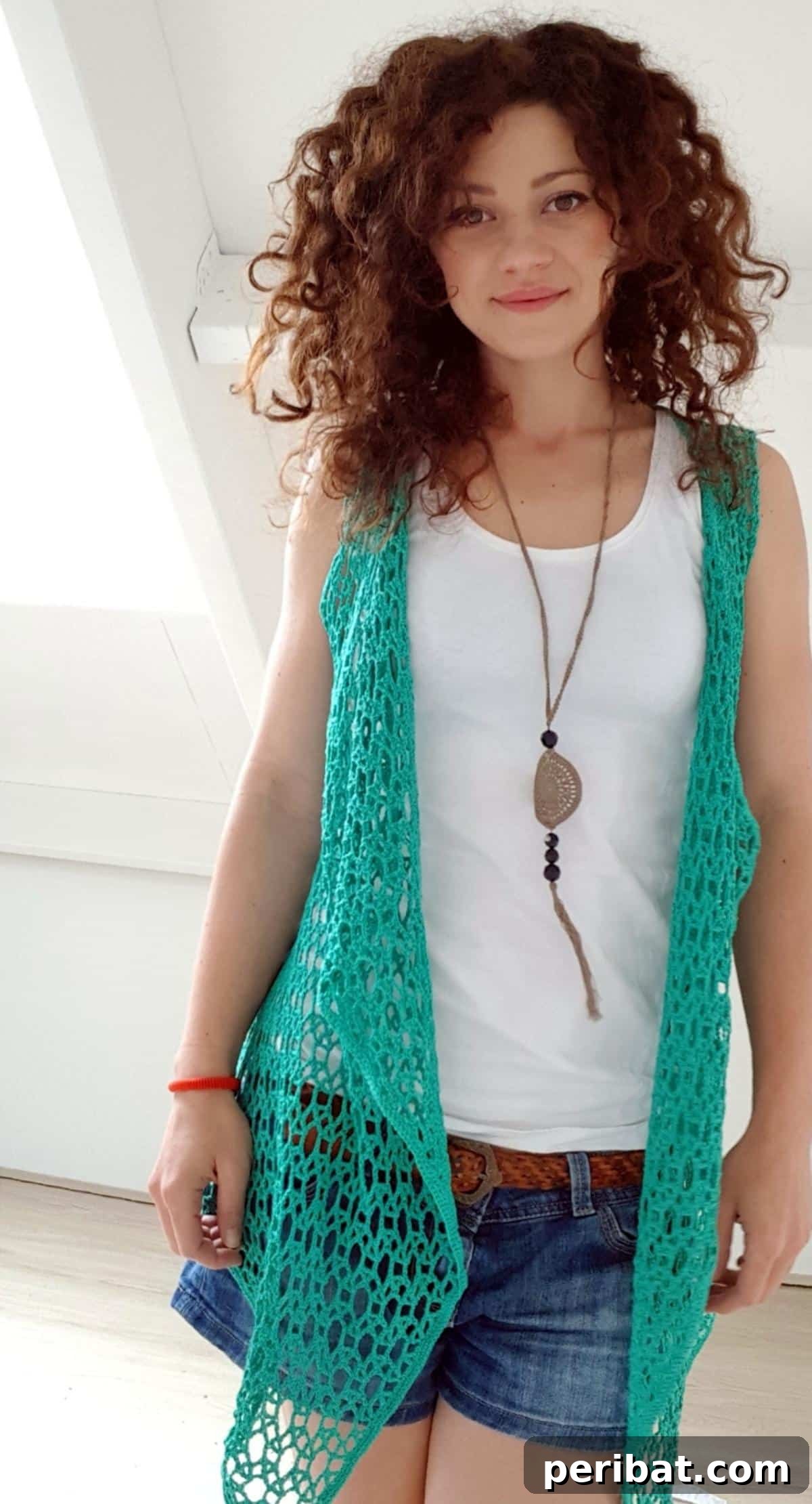 40 Chic Crochet Vest Designs 19 Summer Crocheted Vest - A beautiful lacy vest pattern, perfect for hot summer days, combining delicate femininity with lightweight comfort.