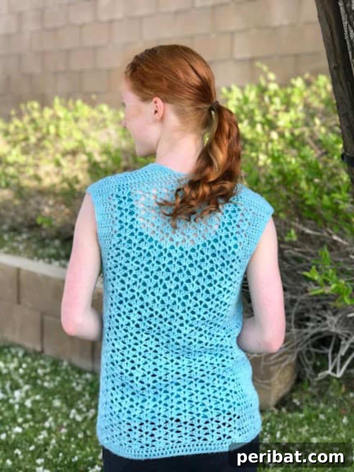 40 Chic Crochet Vest Designs 21 Summer Breeze Vest - A light and airy crochet vest from Desert Blossom Crafts, featuring a simple stitch pattern for a casual summer look.