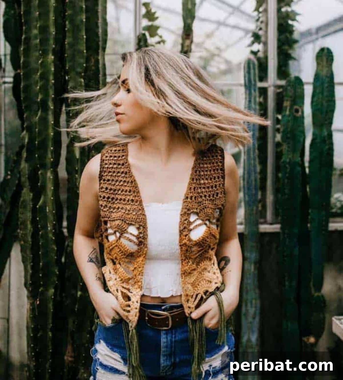 40 Chic Crochet Vest Designs 27 Women’s Crochet Vest With Fringe - A free pattern from Make & Do Crew, adding a touch of boho-chic style with trendy fringe details.
