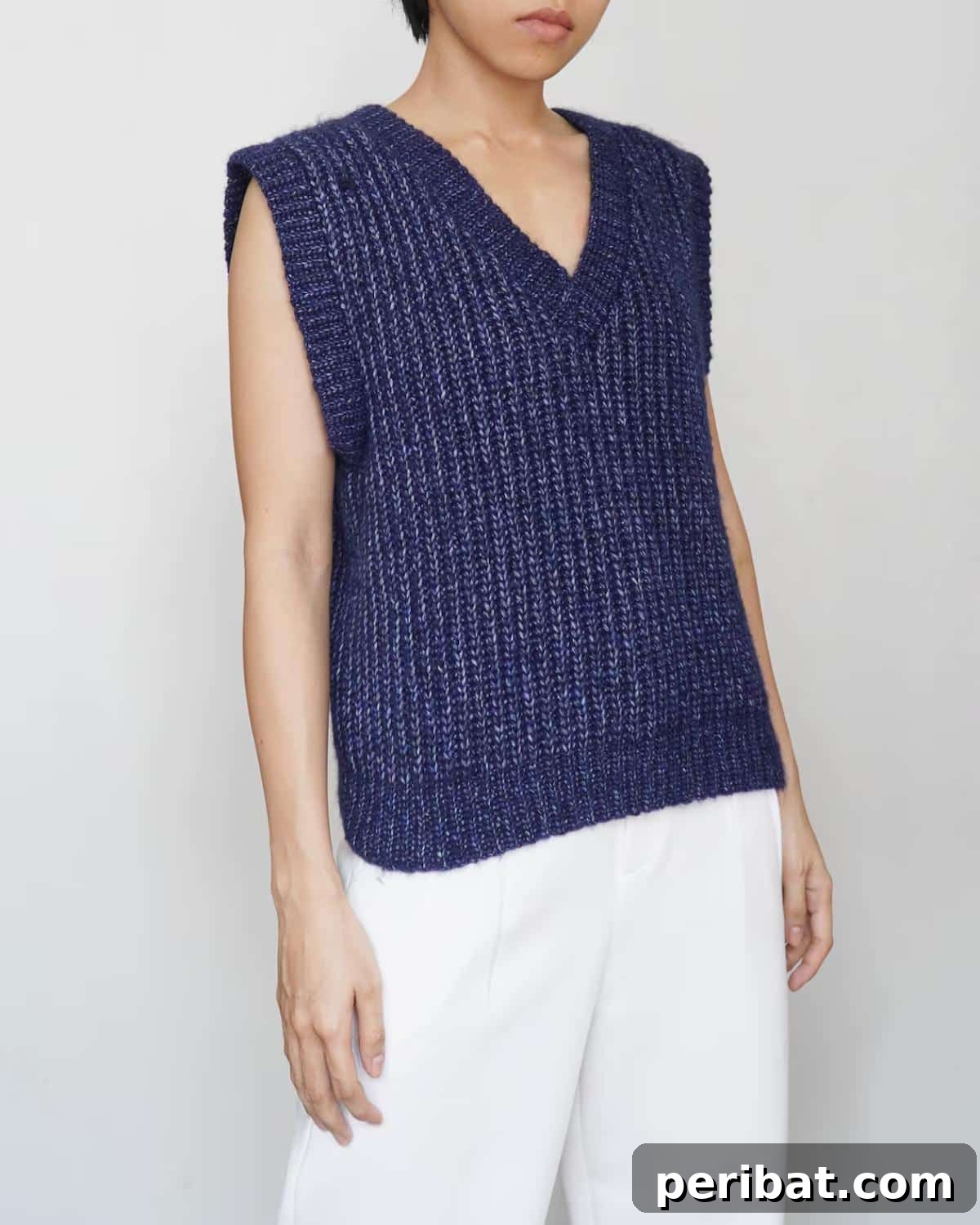 40 Chic Crochet Vest Designs 38 Crochet Ribbed Vest - A timeless and customizable ribbed vest pattern, easy to crochet and adaptable to any size for a sophisticated look.