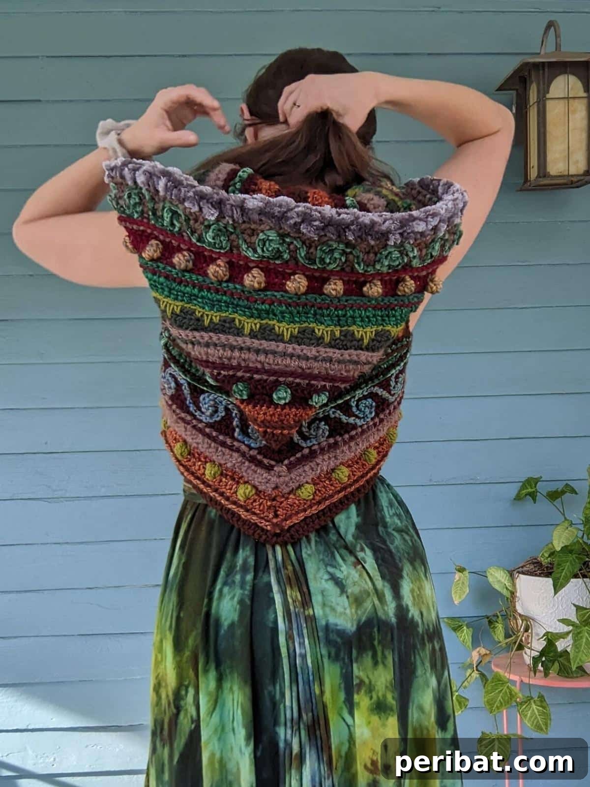 40 Chic Crochet Vest Designs 42 Fae Pixie Vest Crochet Hooded Vest - A whimsical and unique hooded vest pattern, perfect for those who love fantasy-inspired fashion and magical projects.