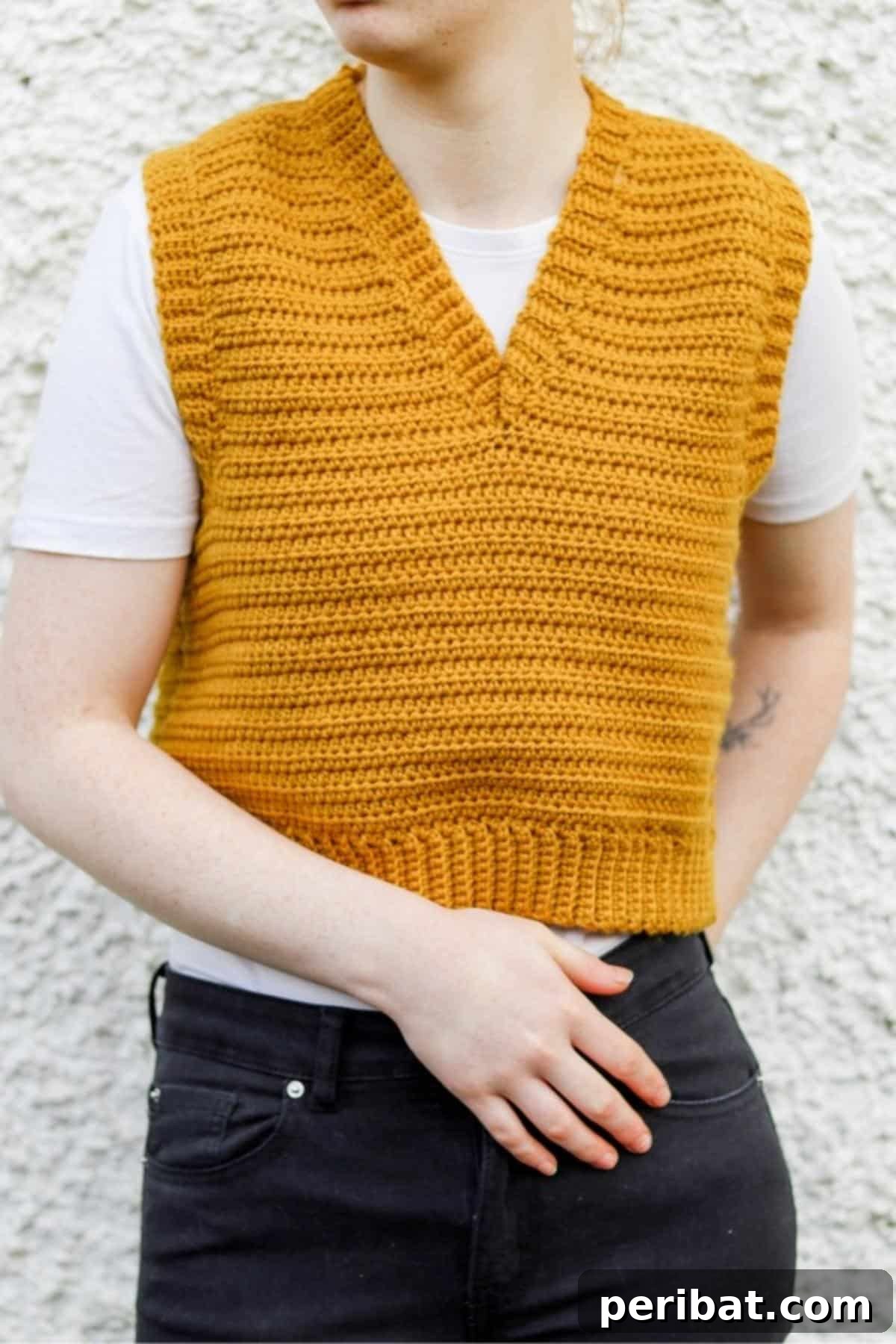 40 Chic Crochet Vest Designs 6 Crochet Vest Top - A modern and versatile design that offers a contemporary take on the classic crochet vest.