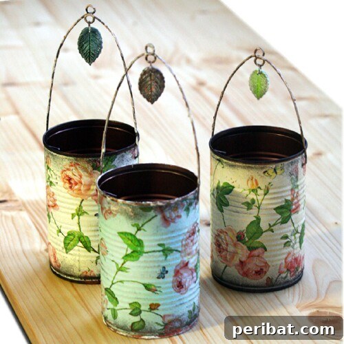 Tin Can Treasures: Transforming Recycled Metal into Stunning Home Decor 34 Hanging decorative tin cans with weathered look and leaf designs
