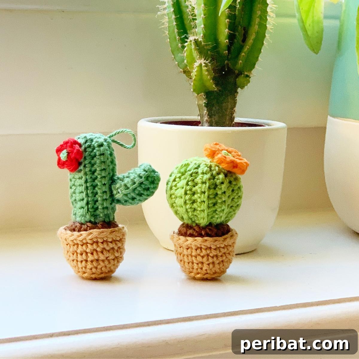 38 Adorable Crochet Keychain Patterns 11 Cactus Crochet Keychains in small green pots.