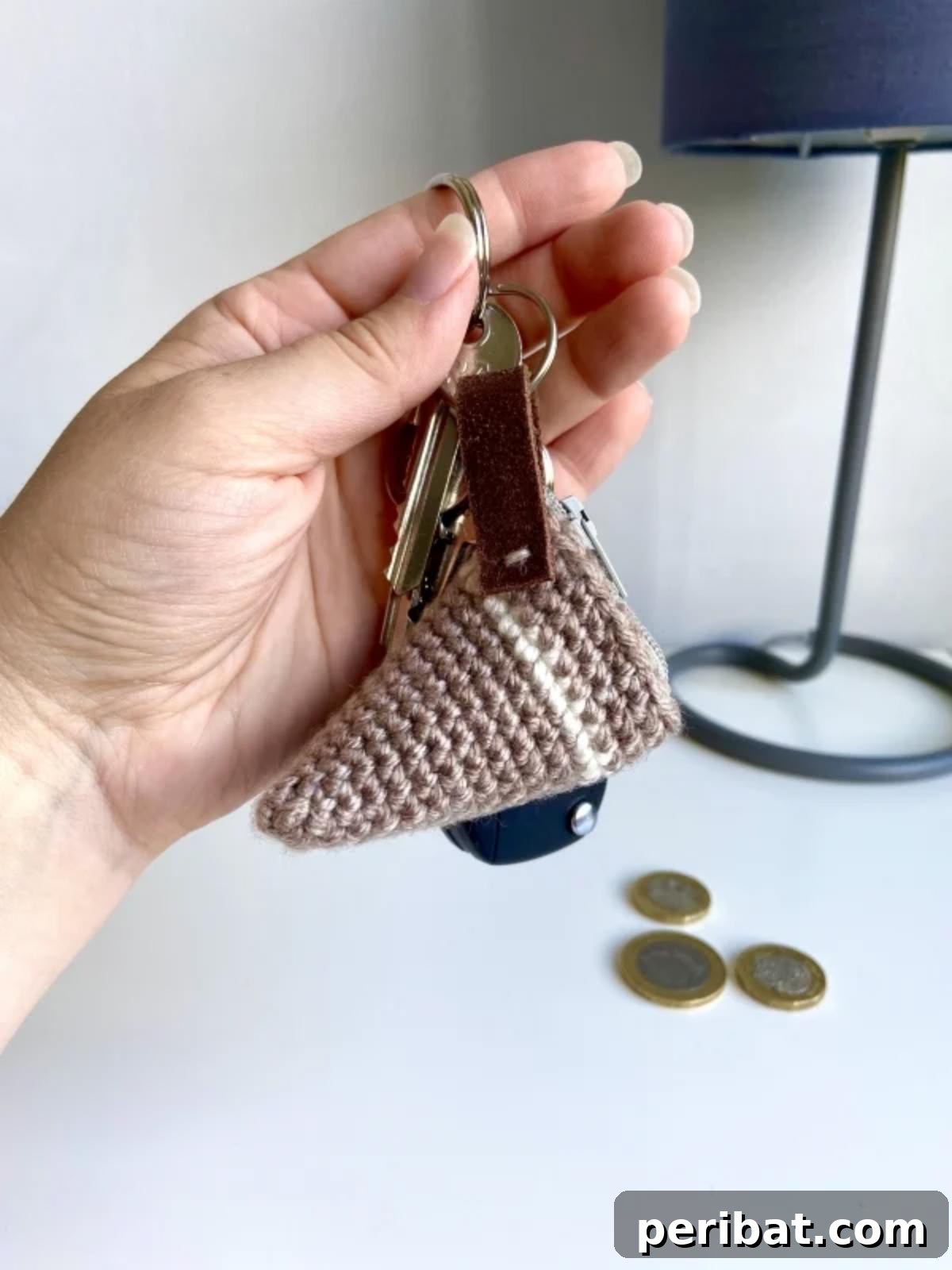 38 Adorable Crochet Keychain Patterns 12 Cute Crochet Coin Purse With Zipper, round and patterned.