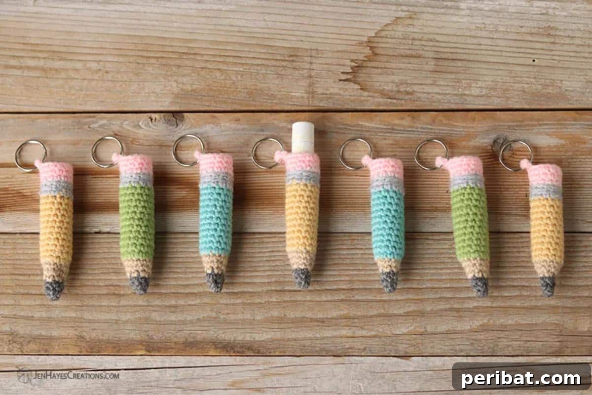 38 Adorable Crochet Keychain Patterns 30 Crochet Pencil Chapstick Holders and Keychains in yellow with pink erasers.