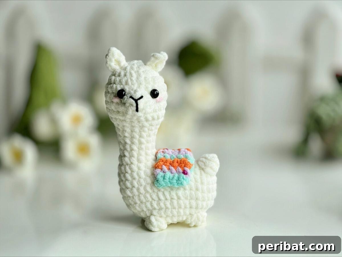 38 Adorable Crochet Keychain Patterns 36 Llama Low Sew Crochet Keychain, a fluffy white llama.