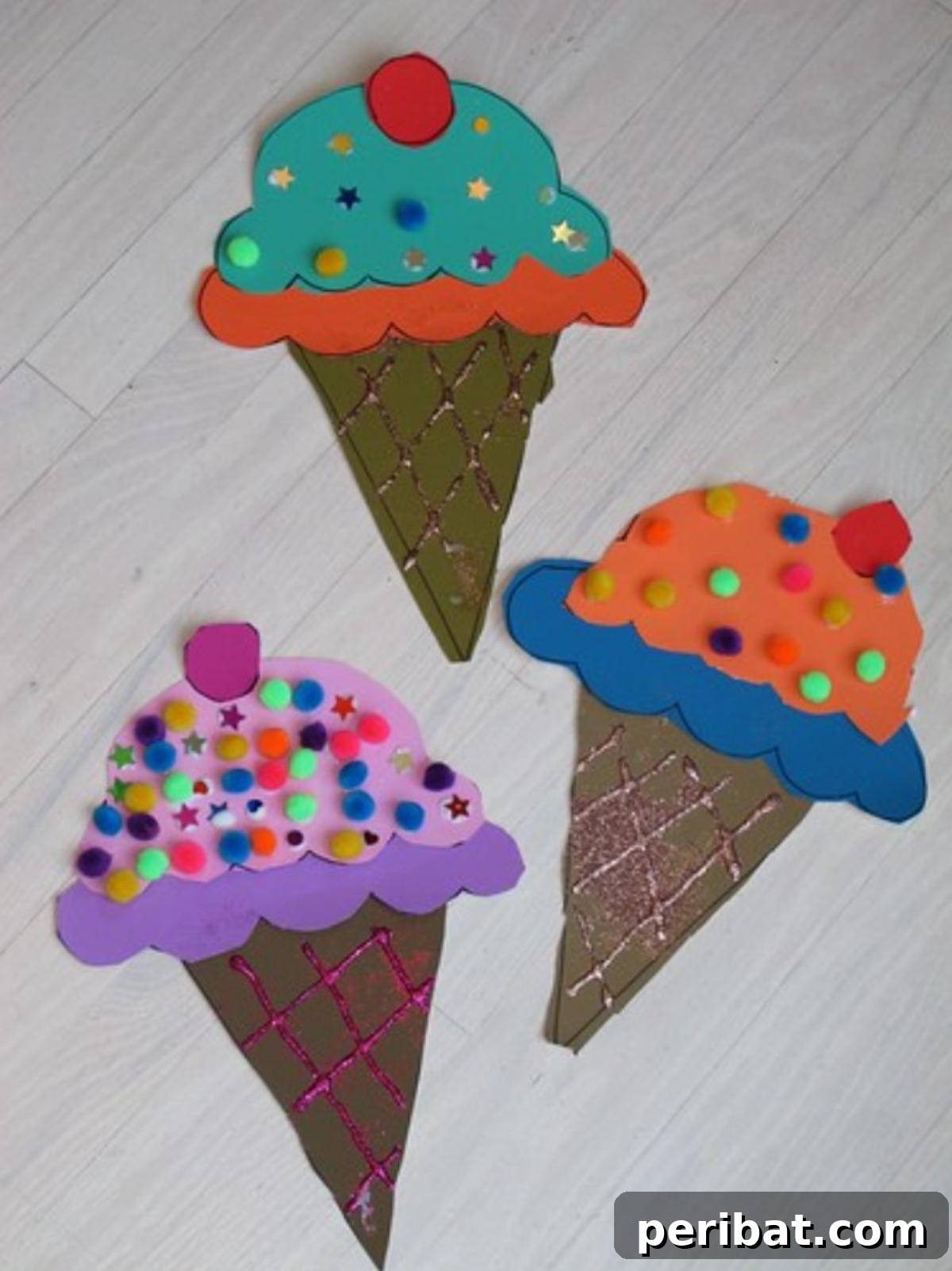 22 Creative Ice Cream Cone Projects for Summer Fun 14 A simple and charming paper ice cream cone craft, featuring a rolled paper cone base and layered paper 'scoops' decorated with markers and glitter.