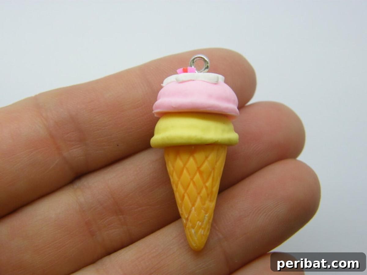 22 Creative Ice Cream Cone Projects for Summer Fun 23 A set of four intricately crafted ice cream cone pendants or charms made with polymer clay, featuring realistic details and vibrant colors, ideal for jewelry making or embellishments.
