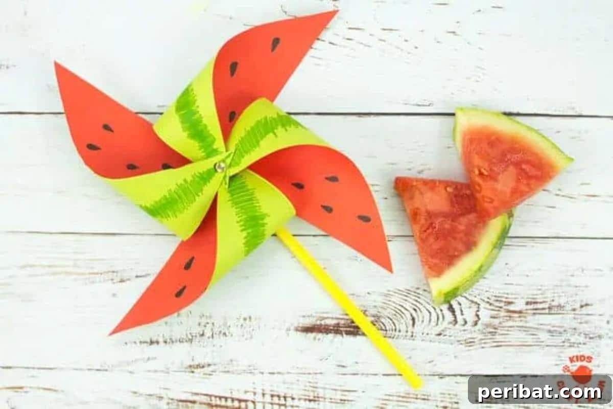 39 Juicy Watermelon Craft Ideas 12 Colorful DIY watermelon pinwheel craft, spinning playfully in the breeze, perfect for summer decorations.