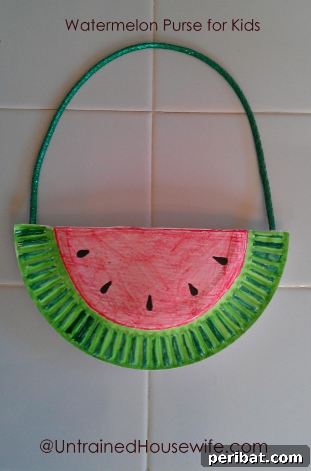 39 Juicy Watermelon Craft Ideas 15 Handmade paper plate watermelon purse for kids, a fun and customizable DIY fashion accessory.