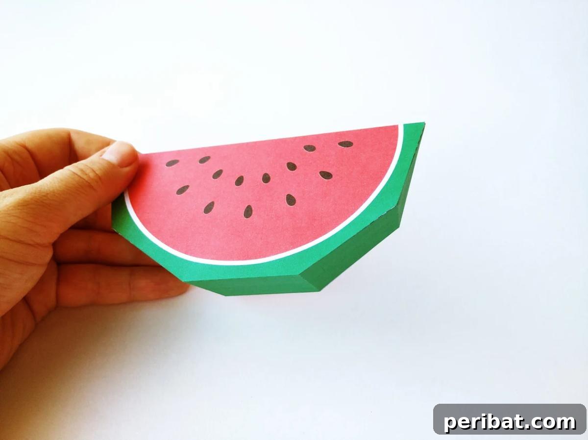 39 Juicy Watermelon Craft Ideas 41 Interactive slice of watermelon DIY papercraft toy, perfect for engaging creativity through assembly.