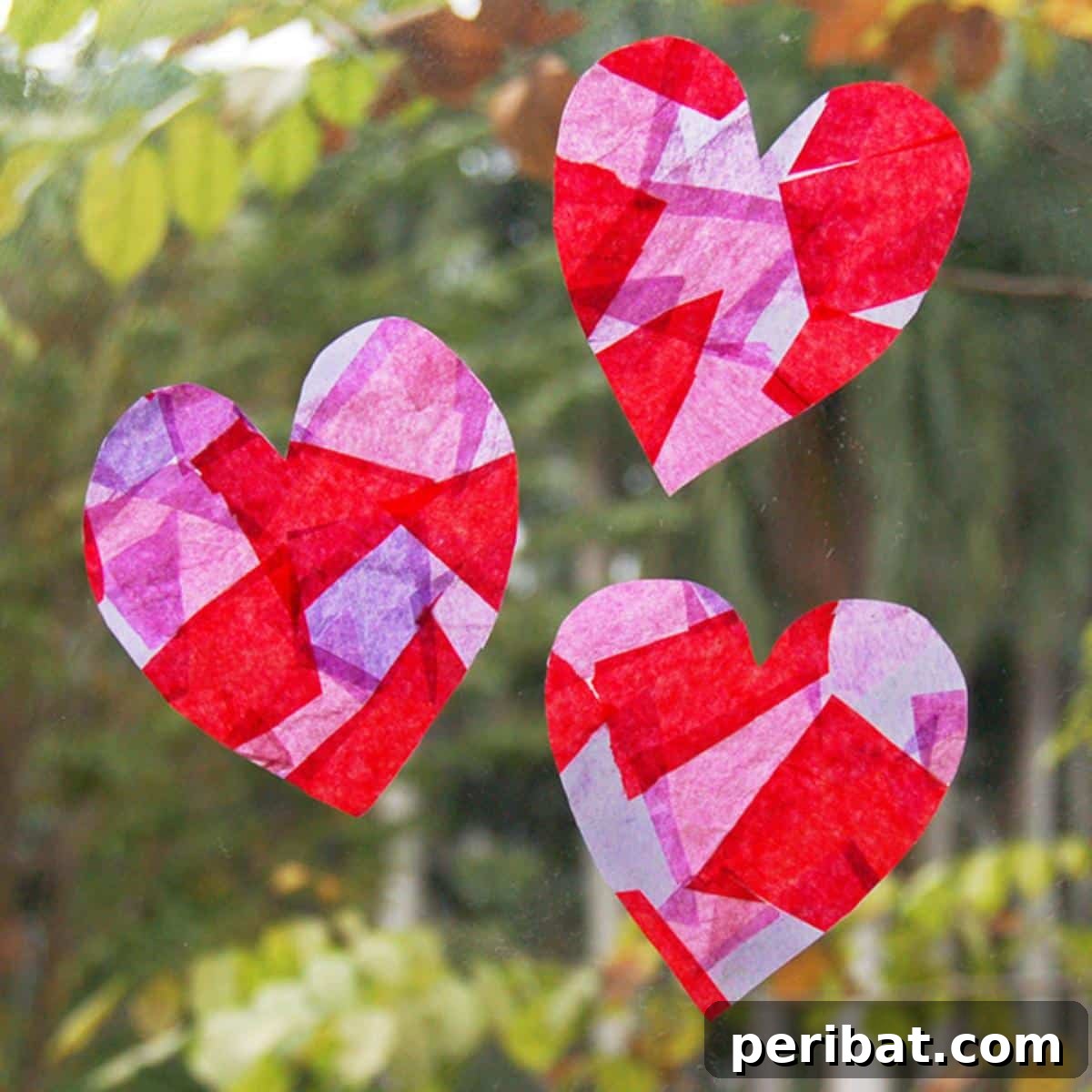 23 Vibrant DIY Tissue Paper Suncatcher Projects 3 A vibrant, multi-colored tissue paper suncatcher with an abstract design, resembling stained glass.