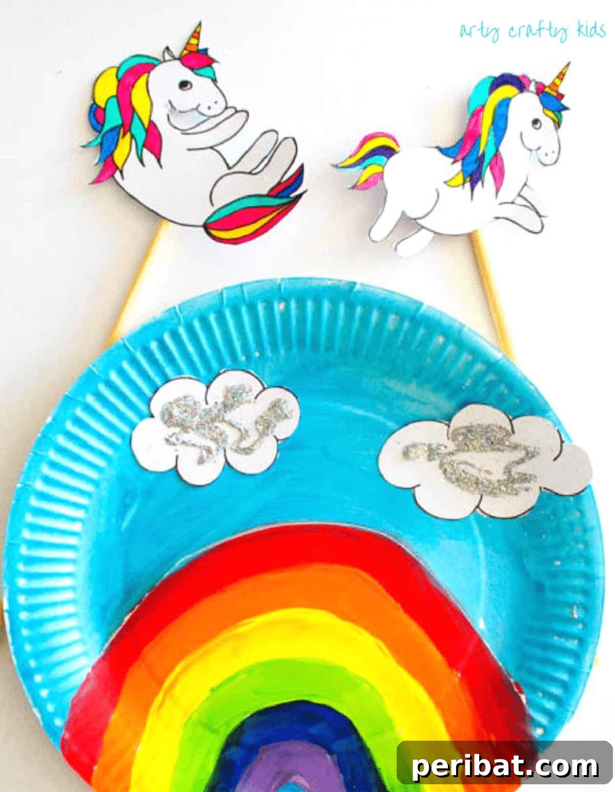 40 Brilliant Rainbow Craft Projects 17 Children holding over the rainbow paper plate unicorn puppets with colorful manes