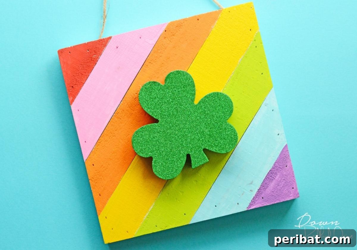 40 Brilliant Rainbow Craft Projects 35 Children's craft showing a vibrant rainbow shamrock art DIY project