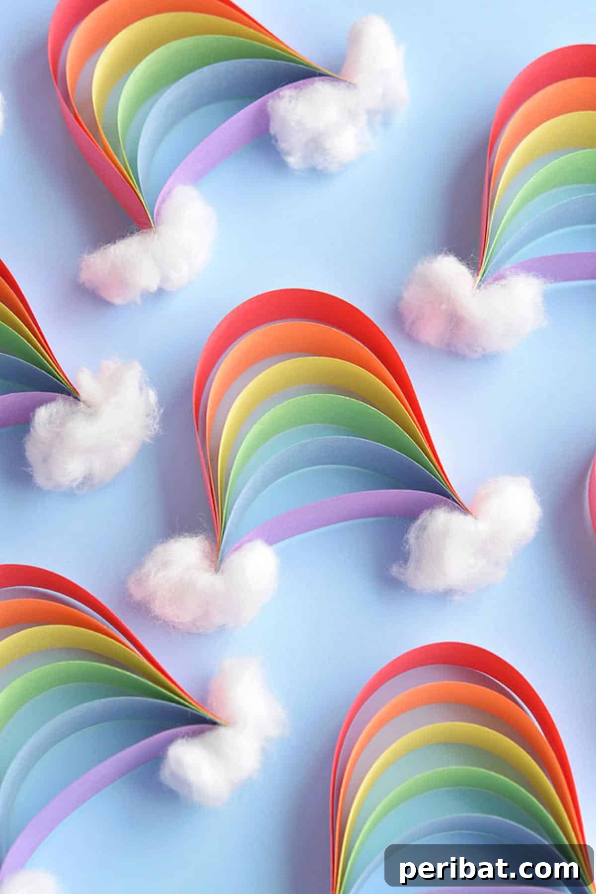 40 Brilliant Rainbow Craft Projects 7 Children's craft: colorful paper strip rainbows with cotton ball clouds